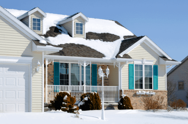 House roof with heavy snow and winterization preparation