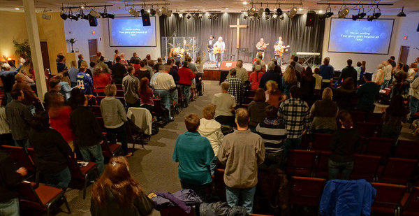 Vineyard Church gathering in Syracuse NY – people in worship and community